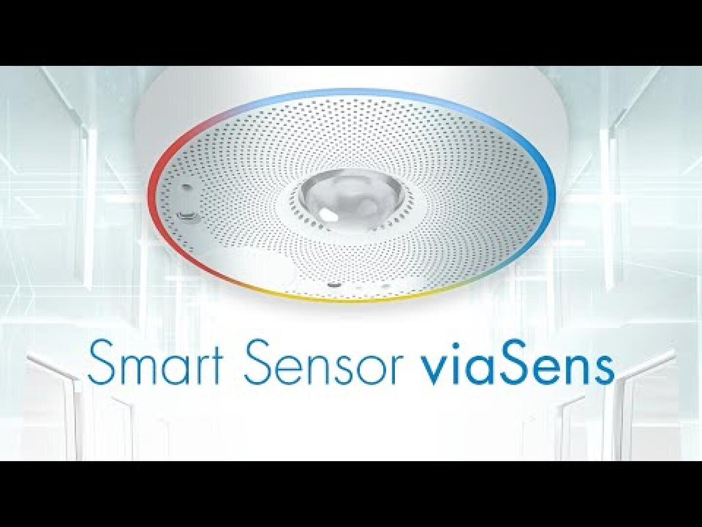 Kreisförmiges Smart-Sensor-Gerät an einer Decke mit blauen, gelben und roten Akzenten, dargestellt über dem Text Smart Sensor viaSens in einer modernen, hellen Umgebung.