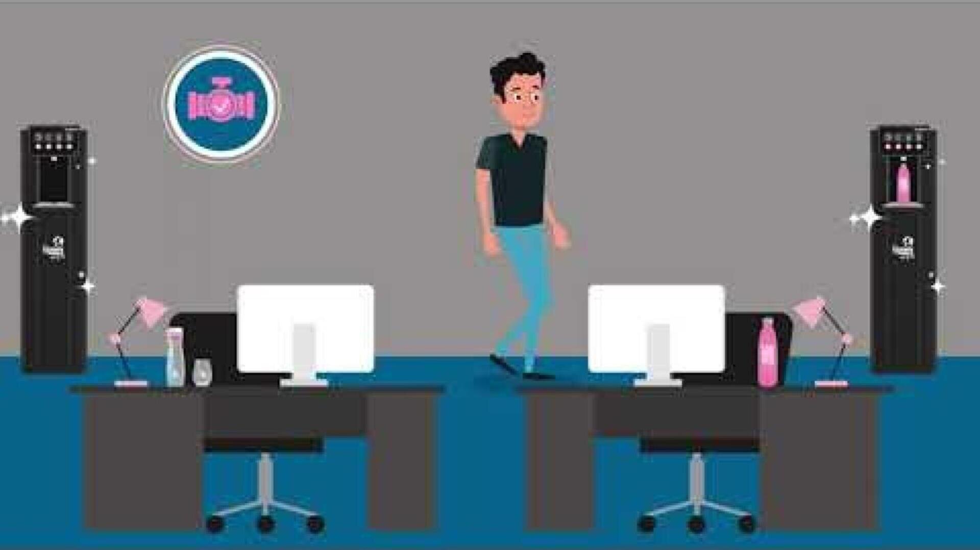 Ein Cartoon-Mann geht zwischen zwei Büroschreibtischen mit Computern hindurch. Jeder Schreibtisch hat eine rosa Lampe und eine Wasserflasche. Auf beiden Seiten stehen zwei Wasserspender, und an der Wand hinter ihm hängt ein gerahmtes Kamerasymbol.